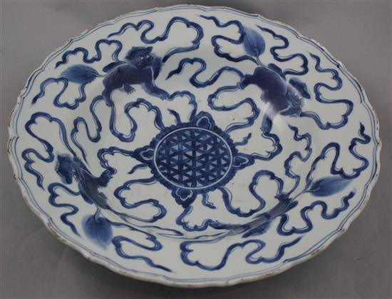 A Chinese blue and white lion-dog dish, Kangxi period, 35.5cm